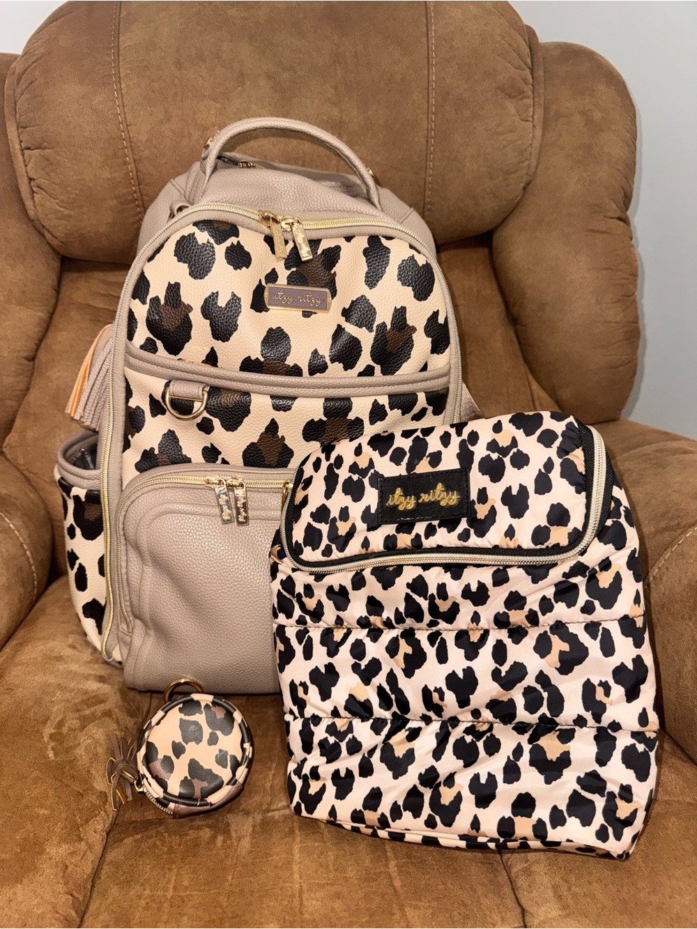 Itzy Ritzy Leopard Print Backpack Diaper Bag Set in Cream and Black